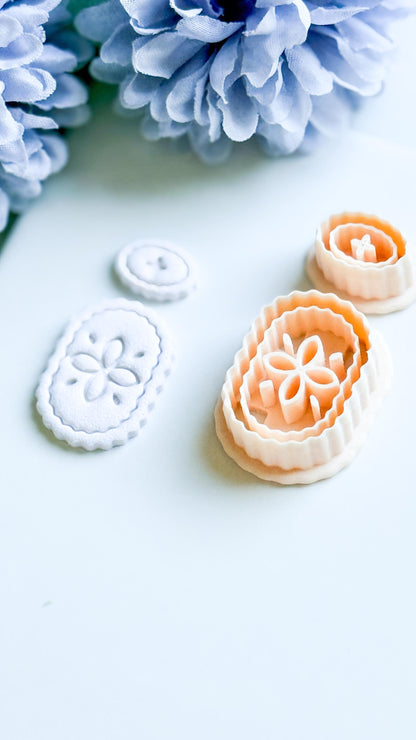 Floral Cameo Clay Cutter: Scalloped Oval Frame with Floral Detail