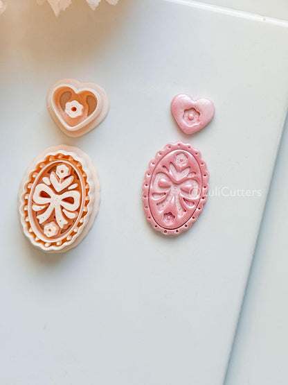 Amelia Bow & Floral Clay Cutter: Oval Pendant and Heart Topper Set