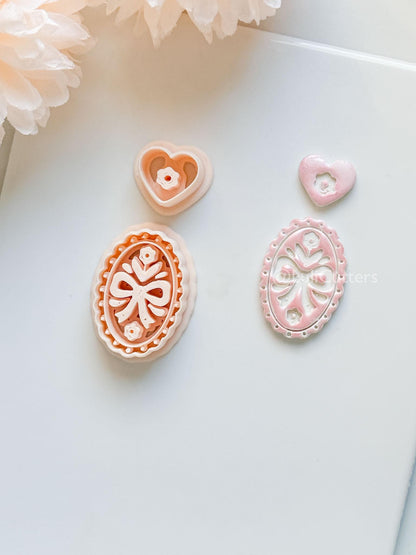 Amelia Bow & Floral Clay Cutter: Oval Pendant and Heart Topper Set