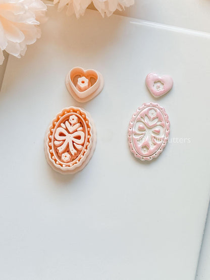 Amelia Bow & Floral Clay Cutter: Oval Pendant and Heart Topper Set