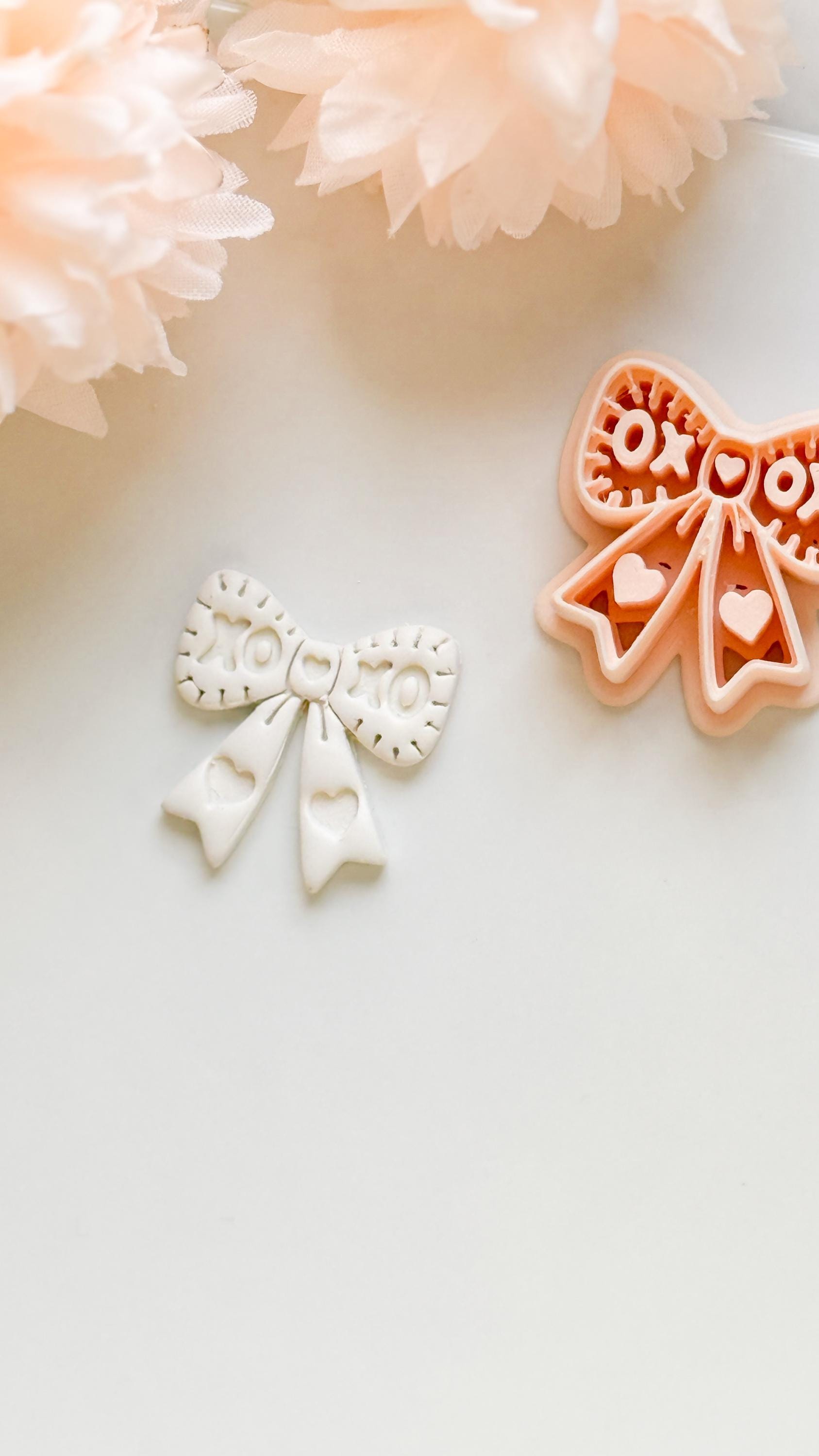 XOXO Bow Clay Cutter: Heart Ribbon Design with Script Embossing
