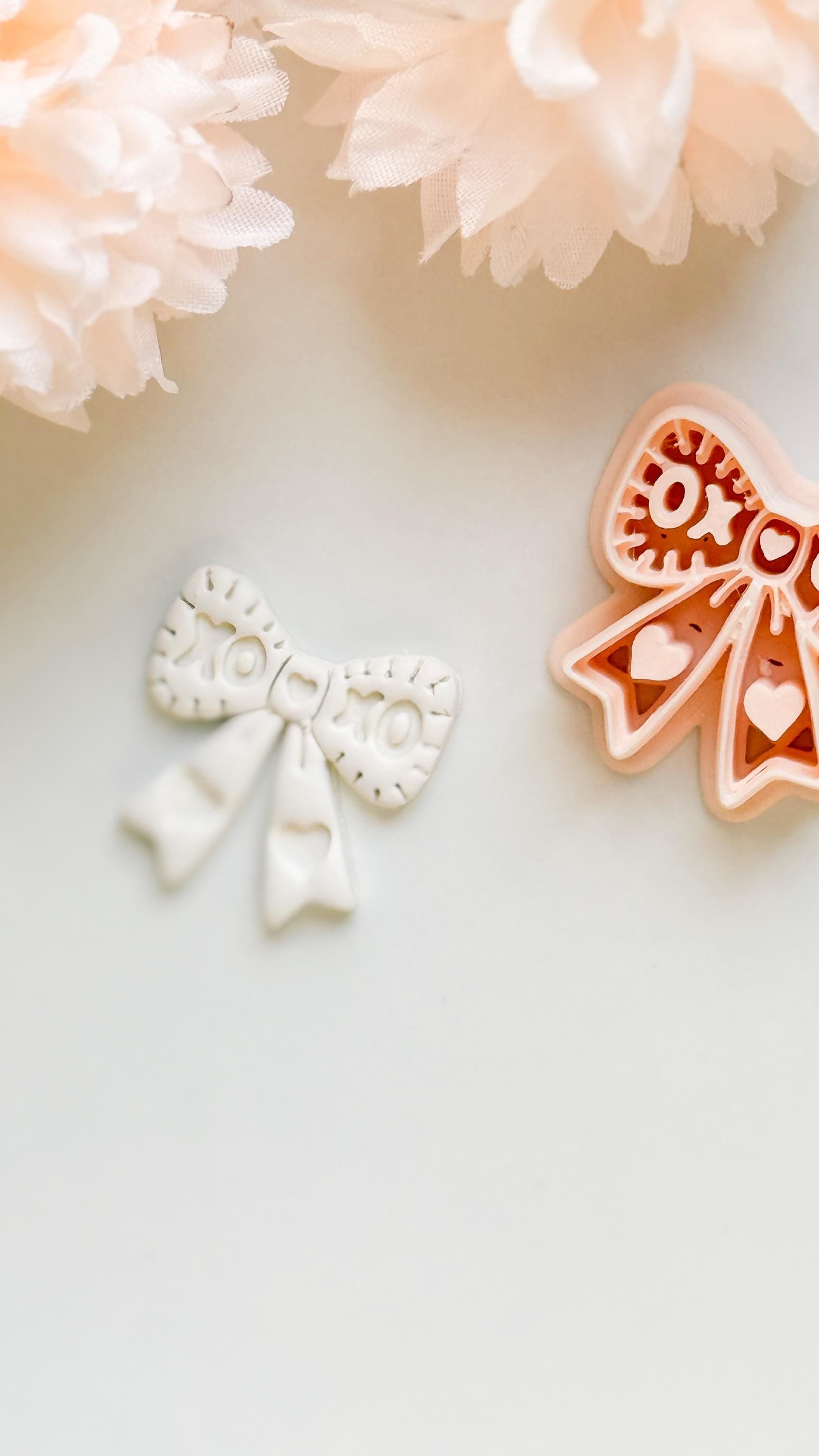 XOXO Bow Clay Cutter: Heart Ribbon Design with Script Embossing