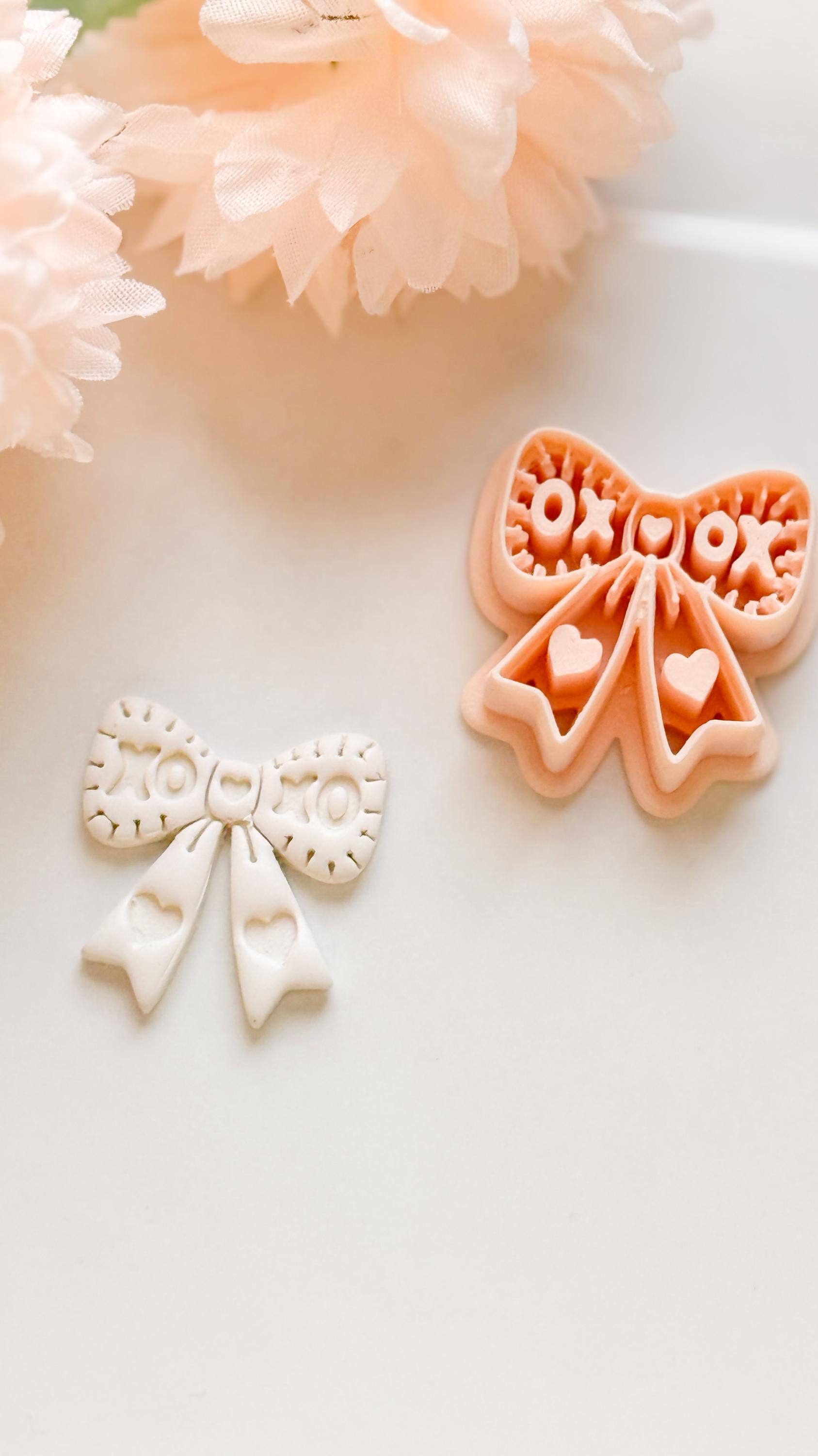 XOXO Bow Clay Cutter: Heart Ribbon Design with Script Embossing
