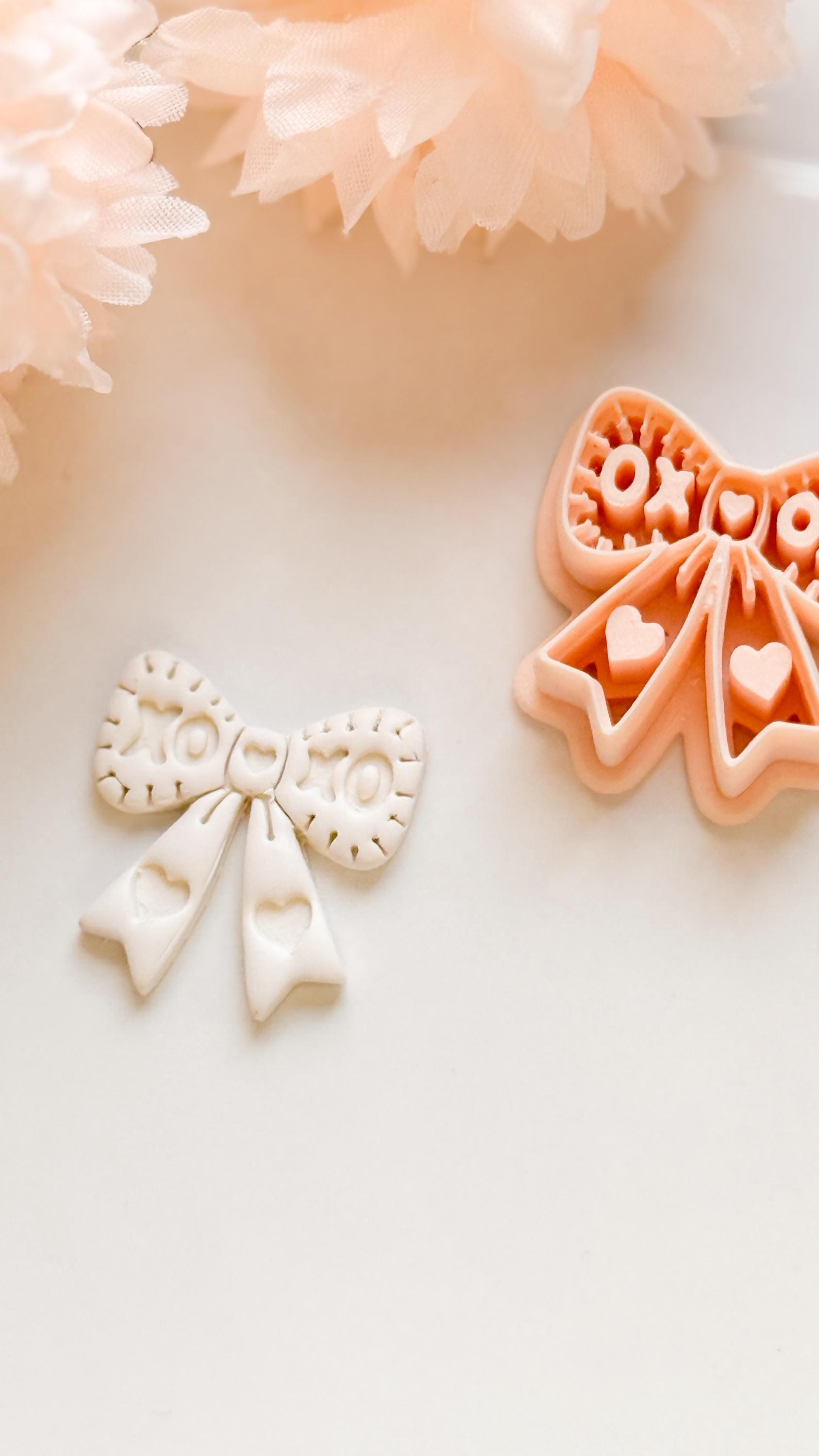XOXO Bow Clay Cutter: Heart Ribbon Design with Script Embossing