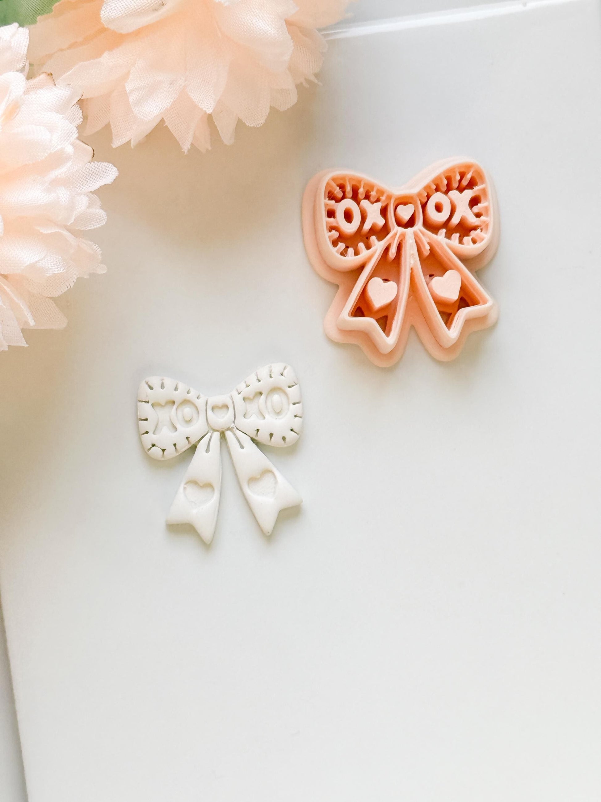 XOXO Bow Clay Cutter: Heart Ribbon Design with Script Embossing