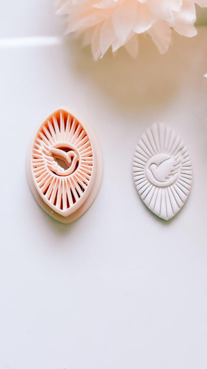 Radiant Dove Cutter: Winged Dove with Sunburst Shape for Polymer Clay