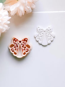 Dottie Bow Cutter: Scalloped Ribbon Shape for Polymer Clay