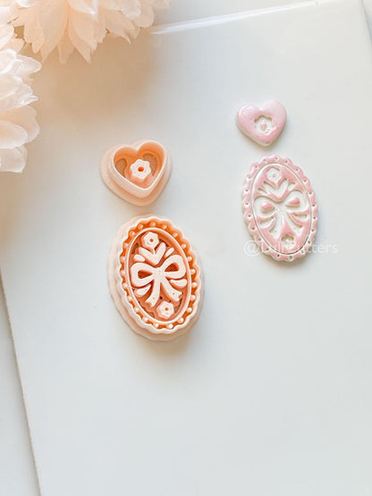 Amelia Bow & Floral Clay Cutter: Oval Pendant and Heart Topper Set