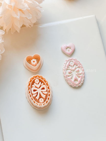 Amelia Bow & Floral Clay Cutter: Oval Pendant and Heart Topper Set