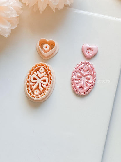 Amelia Bow & Floral Clay Cutter: Oval Pendant and Heart Topper Set