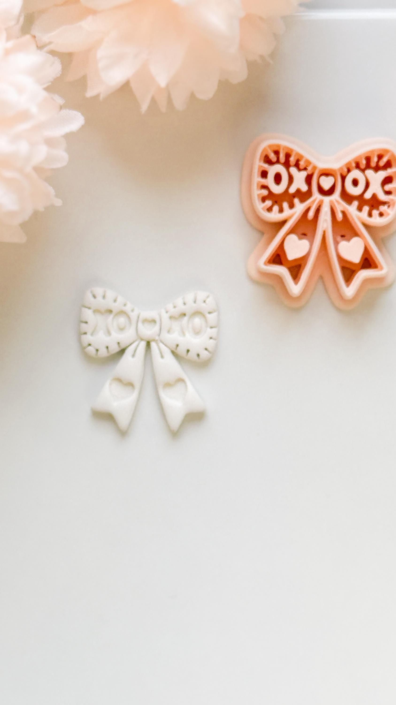 XOXO Bow Clay Cutter: Heart Ribbon Design with Script Embossing