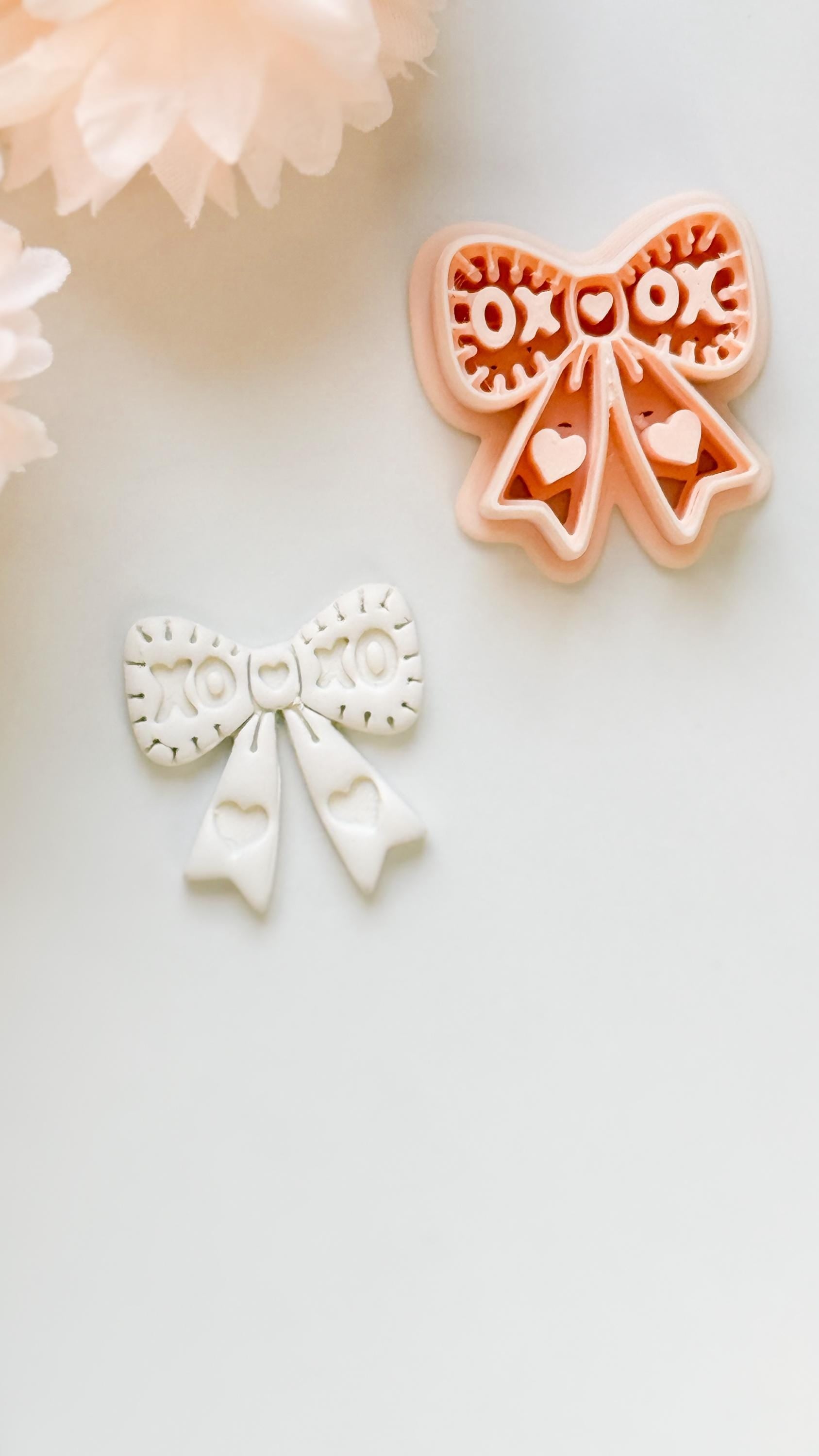 XOXO Bow Clay Cutter: Heart Ribbon Design with Script Embossing