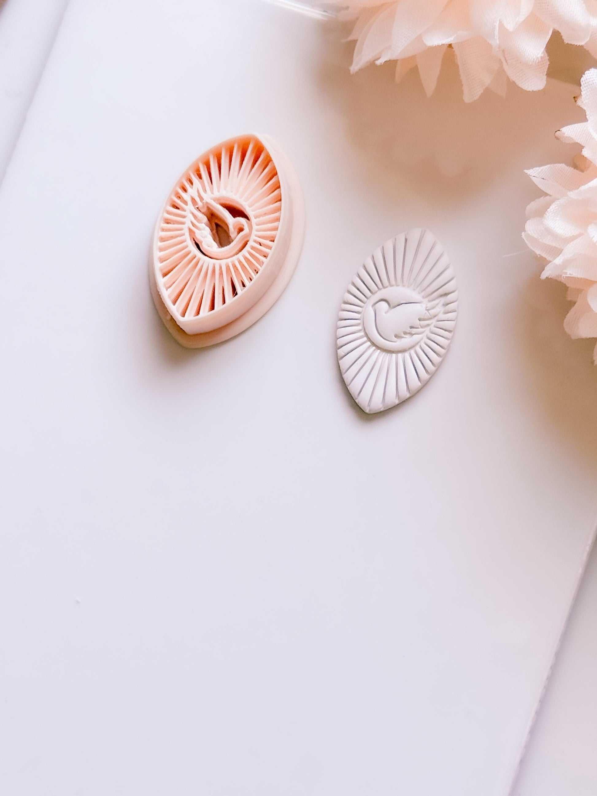 Radiant Dove Cutter: Winged Dove with Sunburst Shape for Polymer Clay