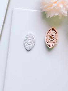 Radiant Dove Cutter: Winged Dove with Sunburst Shape for Polymer Clay