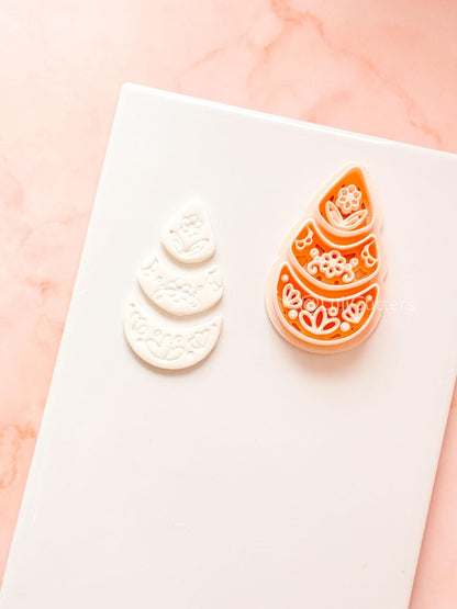 Ottilie Clay Cutter: Tiered Floral Drop Shape