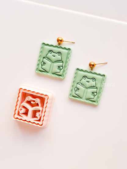 Whimsy Reading Frog Cutter: Charming Bookworm Design for Polymer Clay