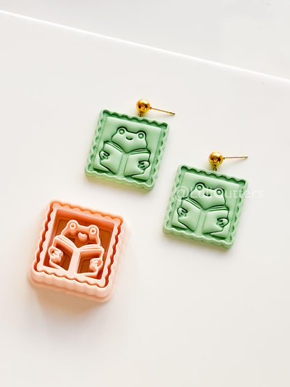 Whimsy Reading Frog Cutter: Charming Bookworm Design for Polymer Clay
