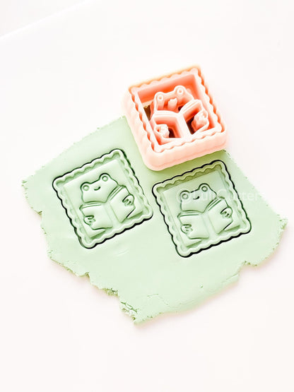 Whimsy Reading Frog Cutter: Charming Bookworm Design for Polymer Clay