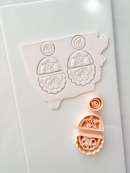 Hibiscus Trio Cutter: Tropical Flower Shell Spiral Shapes for Polymer Clay