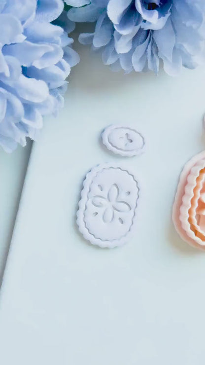 Floral Cameo Clay Cutter: Scalloped Oval Frame with Floral Detail